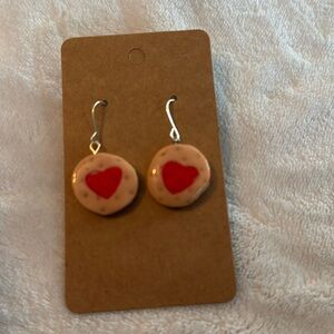 Dangle earrings with heart